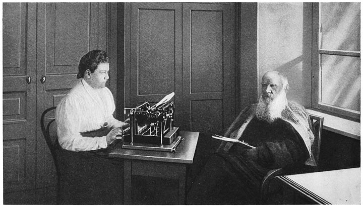 COUNT TOLSTOI GIVING DIRECT DICTATION TO HIS DAUGHTER ON THE TYPEWRITER.