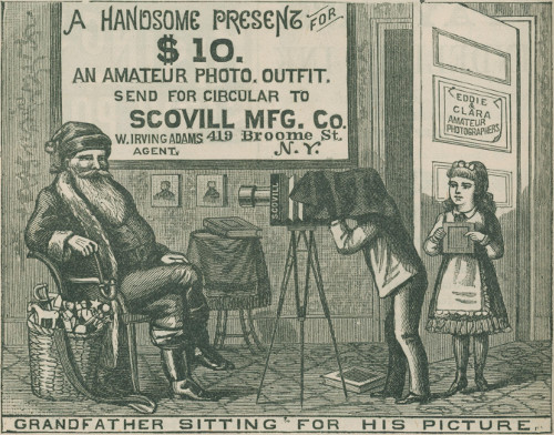 A HANDSOME PRESENT FOR
  $10.
  AN AMATEUR PHOTO. OUTFIT.
  SEND FOR CIRCULAR TO
  SCOVILL MFG. Co.
  W. IRVING ADAMS      419 Broome St.
  AGENT.                N.Y.
  EDDIE
  &
  CLARA
  AMATEUR
  PHOTOGRAPHERS
GRANDFATHER SITTING FOR HIS PICTURE.