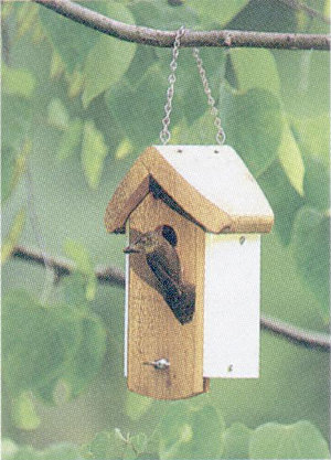 Suspended wooden nesting box