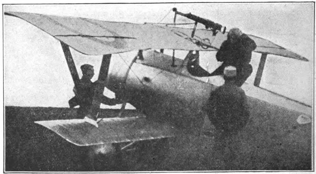Fig. 6. Nieuport Biplane Scout with Machine Gun Pivoted Above the Upper Wing. This Gun Fires Above the Propeller.