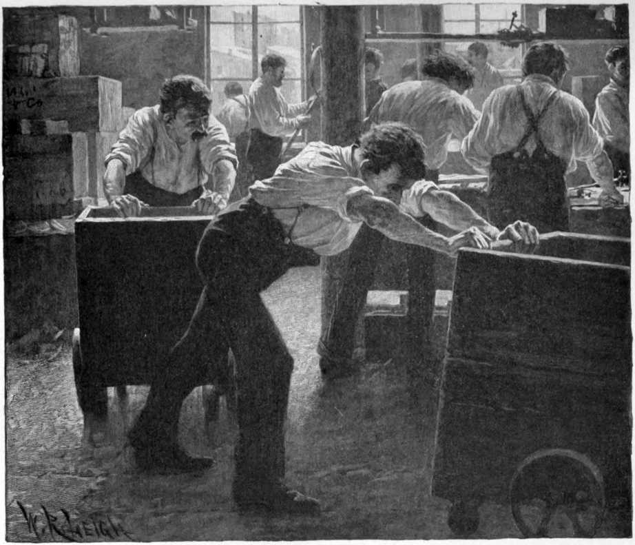 A room full of men. Some are working at a bench.
Some are pushing carts.