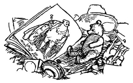 [Teddy bear reading open book]