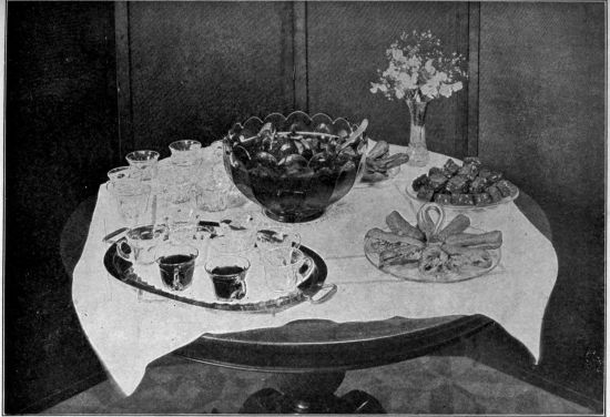 Photo by George H. Davis, Jr.  Courtesy of the Woman's Home Companion


THE PUNCH TABLE

This is a very pleasing form of refreshment during the summer months
