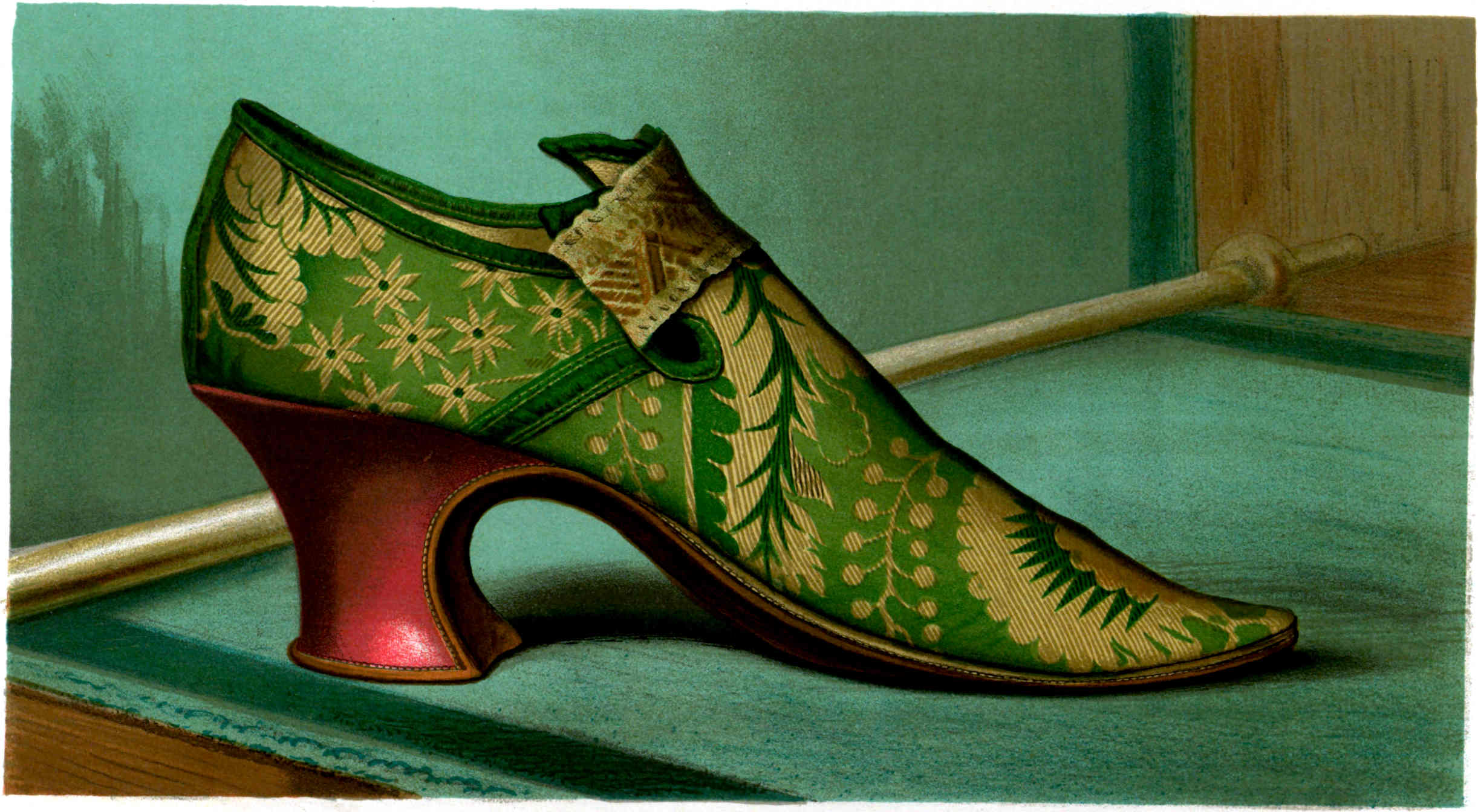 A green high-heeled shoe with a pointed toe, decorated with a gold floral and leaf pattern and a folded strap across the front, and featuring a shiny red curved heel.