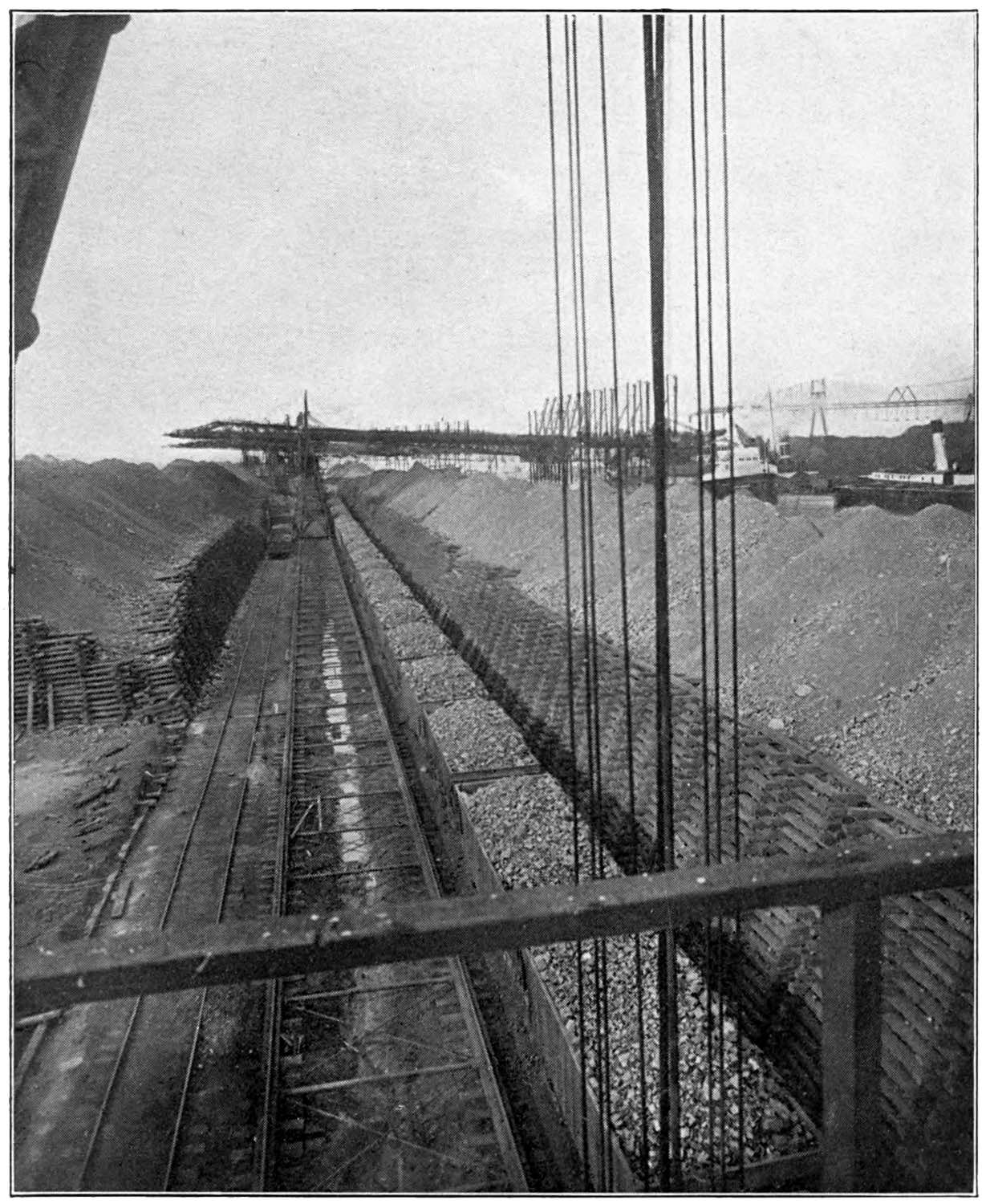 Depicting iron ore
in a series of railroad cars.