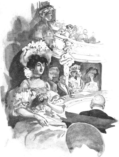 A föltűnően csinos tánczosnő egyedül ült páholyában.