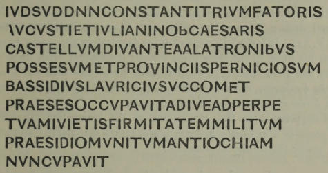 IVDSVDDNNCONSTANTITRIVMFATORIS /
  AVCVSTIETIVLIANINObCAESARIS / CASTELLVMDIVANTEAALATRONIbVS /
  POSSESVMETPROVINCIISPERNICIOSVM / BASSIDIVSLAVRICIVSVCCOMET /
  PRAESESOCCVPAVITADIVEADPERPE / TVAMIVIETISFIRMITATEMMILITVM /
  PRAESIDIOMVNITVMANTIOCHIAM / NVNCVPAVIT
