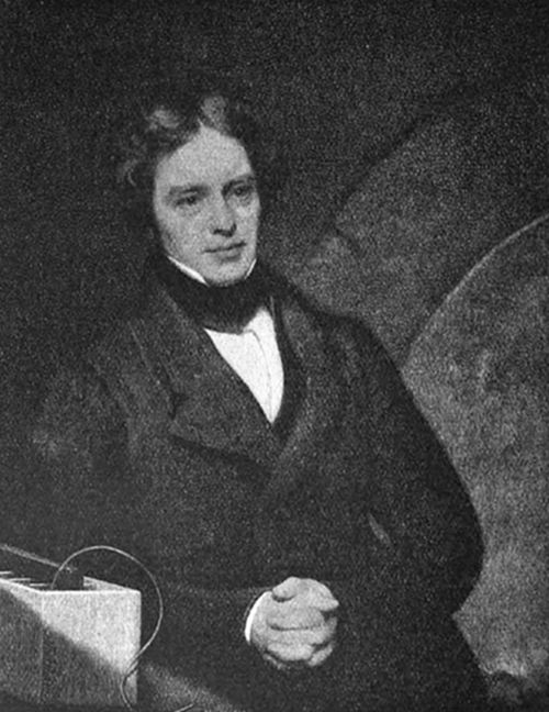A photograph
of a young, curly-haired man in early 19th-century dress with a bow
tie, seated beside scientific apparatus — consistent with portraits of
Michael Faraday, pioneer of electromagnetism and electrochemistry.