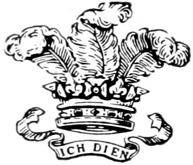 An heraldic emblem featuring the Prince of Wales's feathers—three white ostrich feathers emerging from a gold coronet—above a ribbon banner with the German motto 'ICH DIEN'.