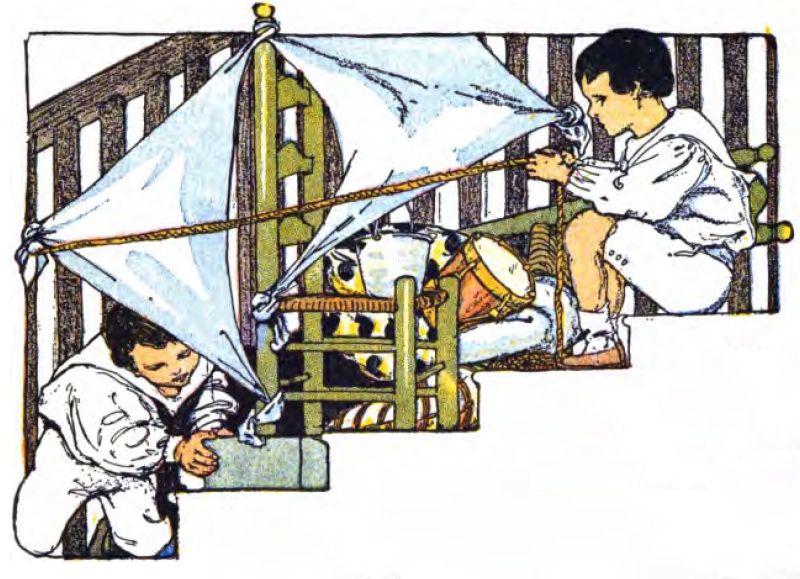 Two children sit on a
staircase, turning household items into a sailing ship. They use two white
blankets for sails, tying them to the balusters and a chair post. A toy
drum sits next to an overturned chair. The child on the right, with dark
hair, sits higher and holds a thick brown rope, pretending to steer. He
wears a white long-sleeved shirt and matching shorts. The child on the left
sits lower, peeking out from under a sail. He holds a gray box or block.
He also wears a white outfit with a dark sailor-style collar.