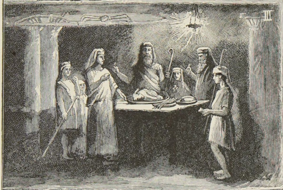 A family sits to eat.