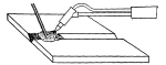 Figure 36,--The Welding Rod Should Be Held in the Molten Metal